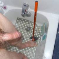 A standing and looking down at my dick and feet view after my shower in late April of 2025. Camera used, Z4.