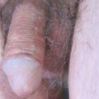 A close up of my dick, which is starting to wrinkle, but there is a bubble of my fluid forming on my tip on May 1ST, 2025... A S95 camera was used.