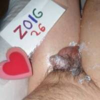 An above view of my smaller dick that has lube upon it and my skin has lube... but, barely any lube on my balls in this scene... A Z50 camera was used.