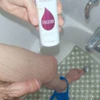 My dick and left leg as I look down plus holding my bottle of 'sensation' shampoo...late April 2025. Another TG 810 camera was used.
