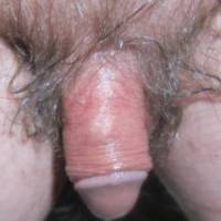A close up from above of my smaller wet dick as I sit at my desk/PC on May 1ST, 2025... A S95 camera was used.