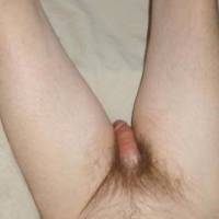 A partial body view from my left side as I am on my recliner with a harder dick some time after the application of tong balm...Late April 2025. FZ 150 camera was used.