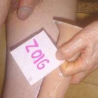 A frontal as I stand near my stove and holding my toy near my dick. A T3 camera was used.