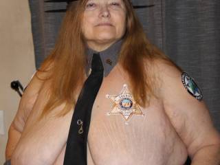 My Lovely Wife Kelly dressed in her Police Officer uniform. Any Witty Comments. lol