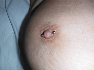 One of my pierced nipples. I love the look and feel of it. Do you like it also?