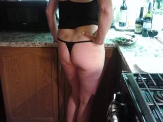 My sexy wife chillin in the kitchen before a little playtime