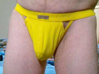 A frontal of my undie as I stand near my bed in late April of 2024. Vlog camera was used.