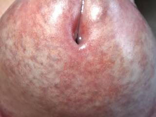 Close up glans with precum