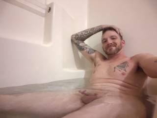 Soaking up the warm water needing a rub