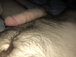 A bead of precum dripping from my hard cock