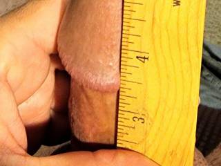 Seem like everyone is into measuring so here's mine. About 5"1/4  inch long.  That 1 inch I lack I make up for with my girth and my fat mushroom head...