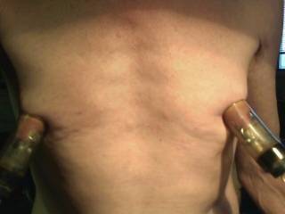 My 6 guage pierced nipples pumped