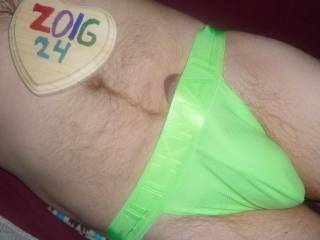 I am in bed wearing a lime undie, and the tip of my erection is more visible. Z50 camera was used.