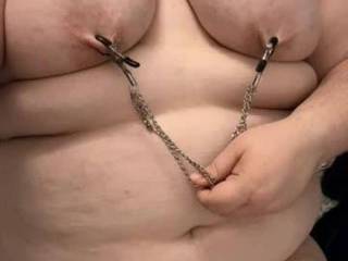 I wanted to see her lift those great breasts with just the nipple clamps.