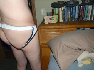 My butt as I stand wearing a bottomless undie and my pillow nearby... FZ 150 camera was used.