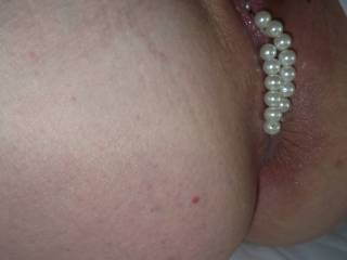 Close up of my tight little holes stuffed full with pearls x