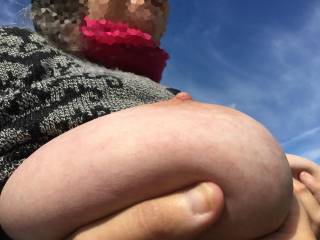 Nice weather to hold big tits up, and have no underwear on for two guests ...