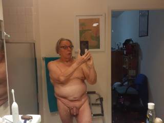 In the bathroom in front of the large mirror. Like I said, I'm working on the fat.
