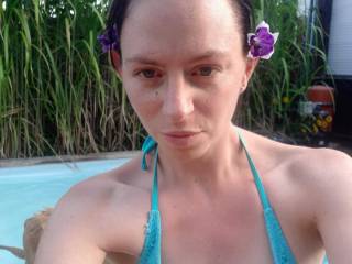 Just a face shot of me with a bikini top on.