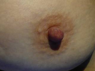 Just thought we'd share some pix of her nipple.  Pretty nice... very responsive.  Enjoy.  Let her know if you really like.