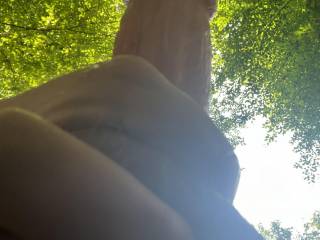 Love stroking my hard cock outdoors.…view from below!