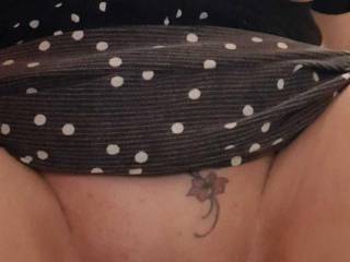 That naughty tattoo makes regular appearances in public, as do her tits.