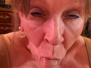 Tammy sucks my dick hard and she swallows every drop. She deserves it. I\'m filling her mouth with a big load right there.