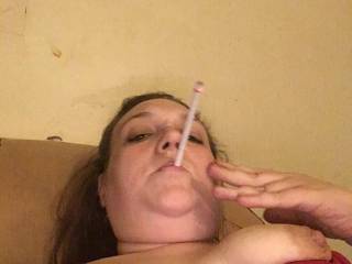 My wife taking smoking selfies with my phone.