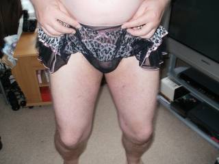 pulling them up to show dick inside