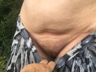 An indication of big tits above, from the topless lady standing in a field. Yet ... for now the guest ignored them, and goes instead for a look at her cunt. Understandable I guess ;)