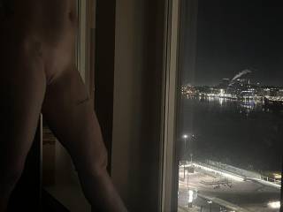 Beautiful wife on Valentine´s Day looking out of the window...