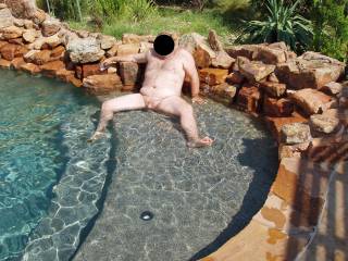 I took away hubby\'s swim trunks and made him pose nude for me in our pool!
