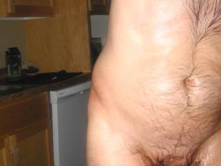 A close partial body and frontal view with my dick and part of my chest on May 2ND 2025. A S70 camera was used.