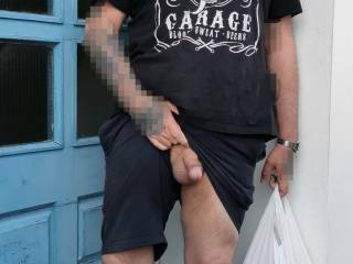 After playing at home and edging all afternoon, we decided to go to the shop for more drinks. Mrs completely naked under a summer dress, me desperately needing to cum. Stopped in a public street doorway for a risky picture.