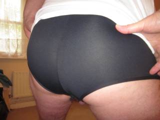 My ass accentuated by my tight black football shorts
