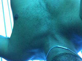 Sitting around relaxing in the tanning bed