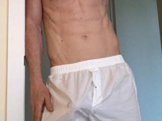 Just the boxer shorts to go. Can you see my cock pressing against the thin cotton?