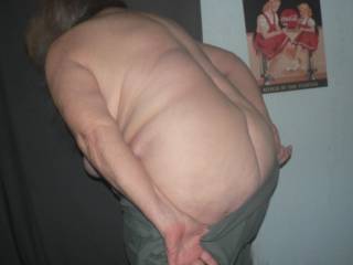 REMOVING MY PANTS SO YOU CAN RUB YOUR COCK ON ME.