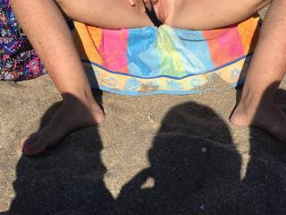 Showing pussy to new friends on the beach