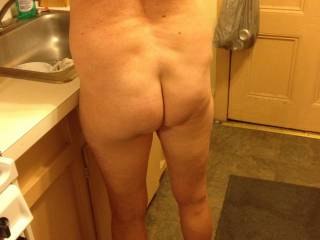 Naked in the kitchen
