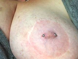 Love my nipple piercing it feels so amazing to touch. Wanna se the other?