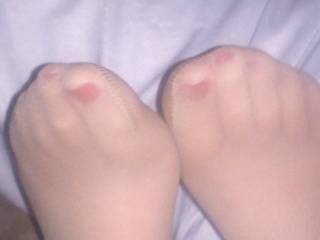 mi wife's nylon covered feet and toes........