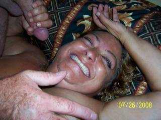 deb always smiles with a cock in her hand