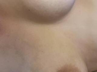 Bbygrl’s laying in bed naked so I thought I’d take some pics of her big natural tits