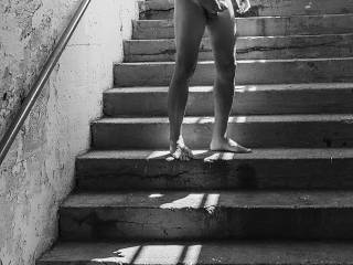 A friend came over during the summer on one of the hottest days of the year and decided to pose in the stairs of the local commuter train station. Did he have the right fare to board the train?