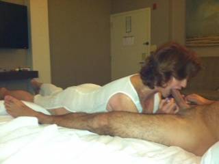 Wife giving boy toy a blow job at a hotel.  Think she needs one behind her too ?