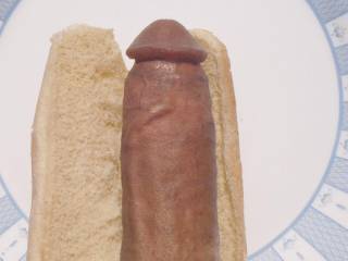 Add your own dressing to the hot dog.