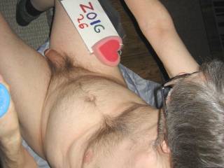 A partial body above selfie as I sit at my desk/PC with a hard dick. A SD600 camera was used.