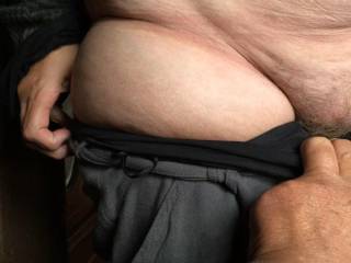 A helping hand - she pulls her underwear down from the side, he goes for the front