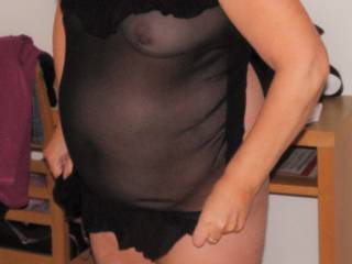 Sheer black looks very hot on her, a great turn on for me.
